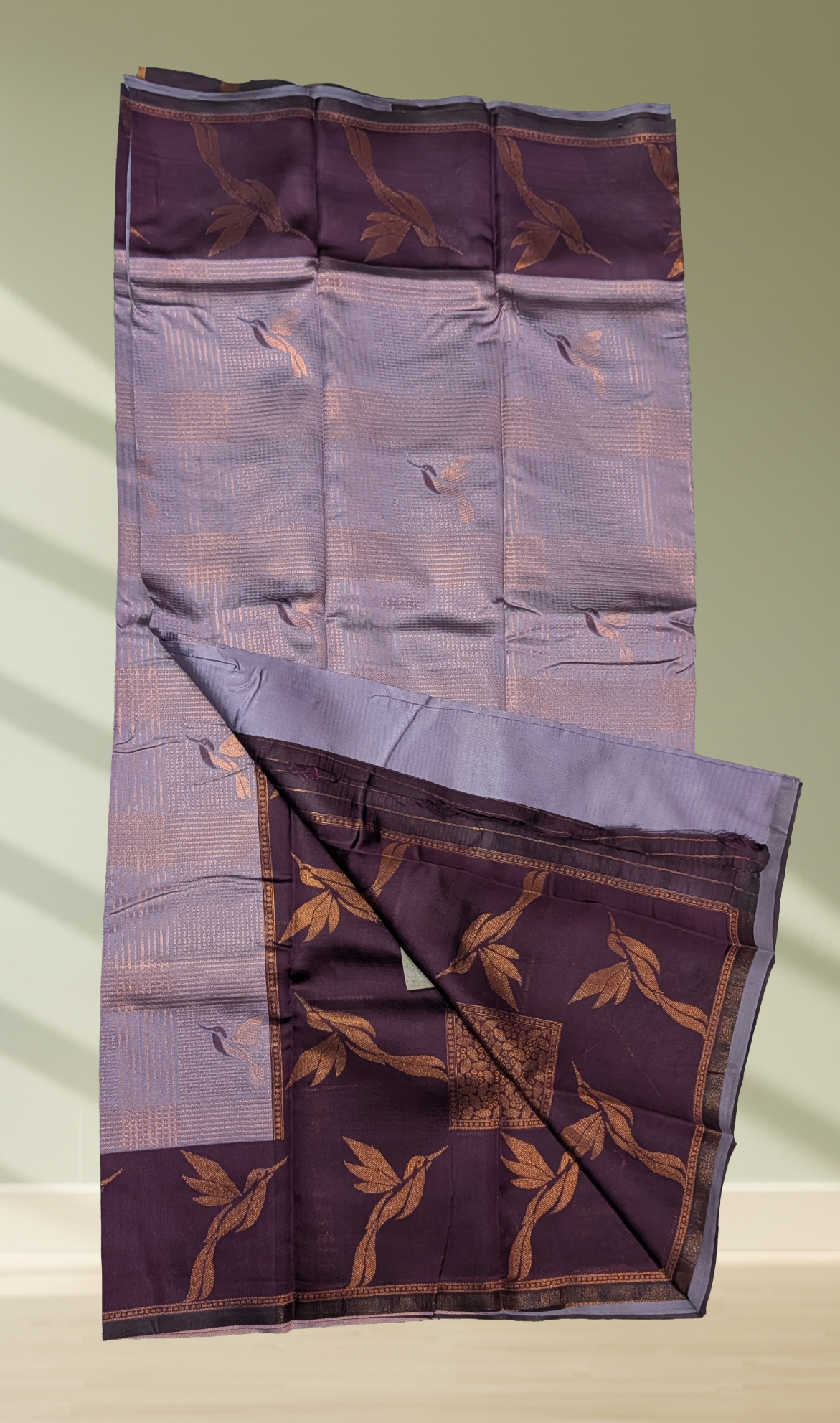 Lavender Fancy Tussar Silk Saree showing pallu with golden bird and leaf motifs on deep purple