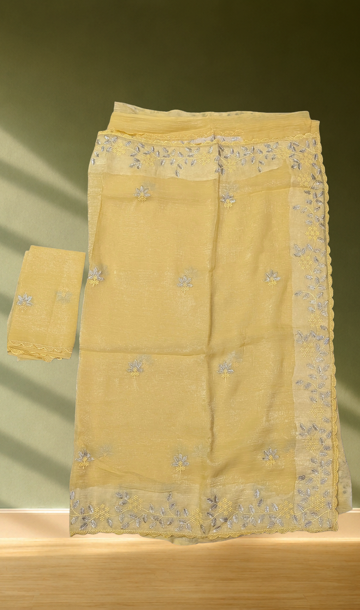 Pastel Yellow Georgette Saree with SilverThread Embroidery & Blouse Piece