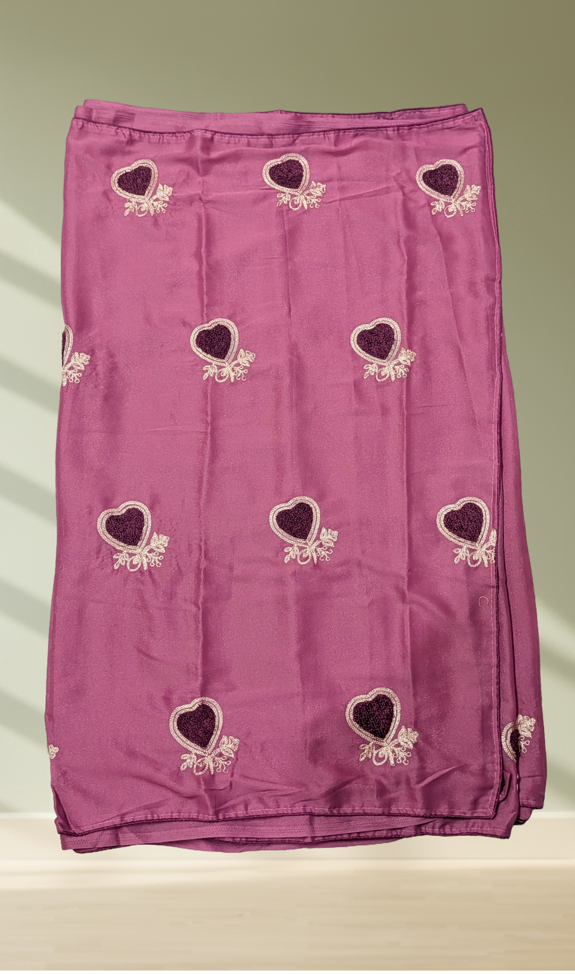 Mauve pink heart embroidered georgette saree