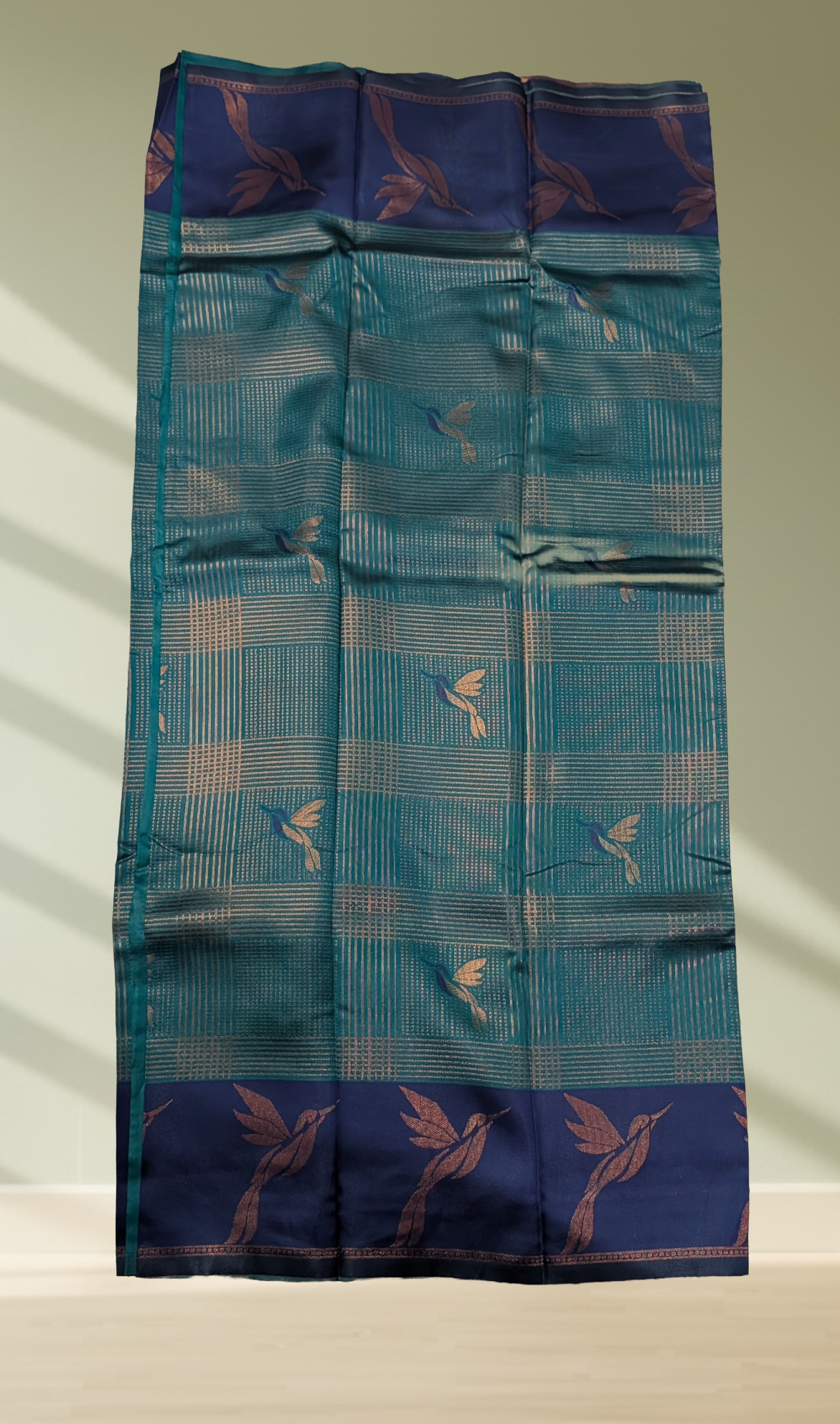 Teal and navy blue bird motif silk saree