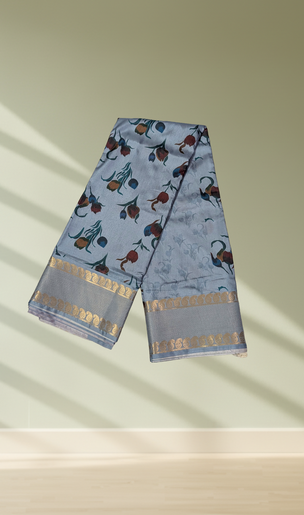 Steel blue floral print silk saree with gold zari border